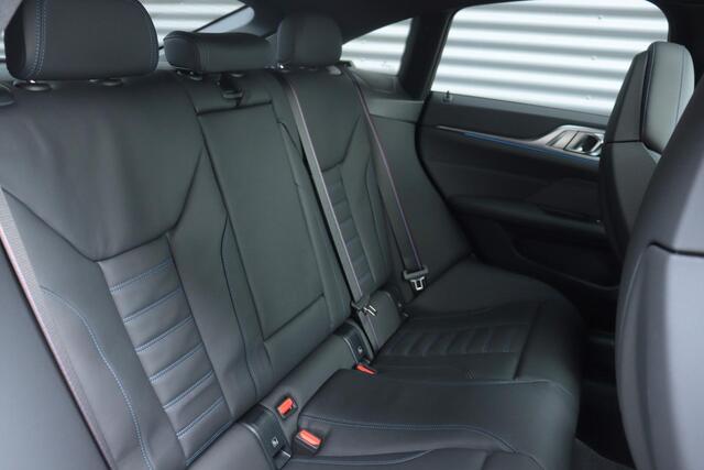 BMW i4 eDrive40 | High Executive / M Sportpakket Pro / Panodak / Driving Assistant Prof. / Harman Kardon / M Sportstoelen / Trekhaak | Easter