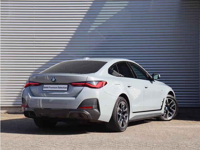 BMW i4 eDrive40 | High Executive | M Sportpakket | Achteruitrijcamera | HiFi | Elektr. Achterklep | Apple Carplay | 18'' LMV