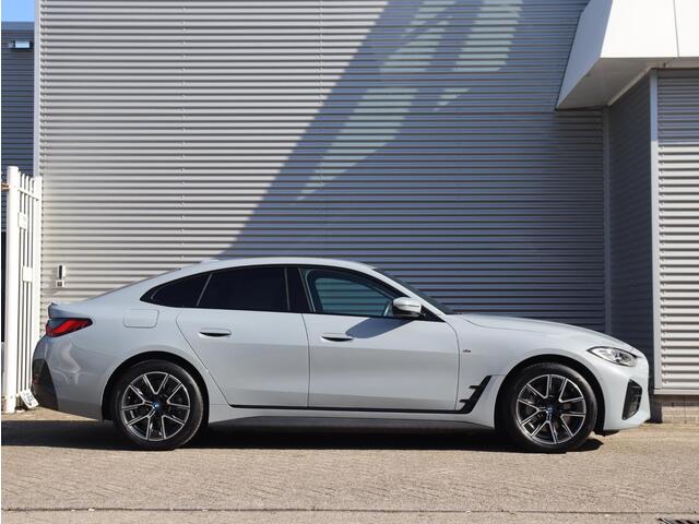 BMW i4 eDrive40 | High Executive | M Sportpakket | Achteruitrijcamera | HiFi | Elektr. Achterklep | Apple Carplay | 18'' LMV