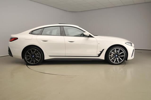 BMW i4 Gran Coupe eDrive40 | M-Sportpakket | LED | Navigatie | Schuifdak | Elektr. zetels | DAB | Harman-kardon sound | Alu 19 inch