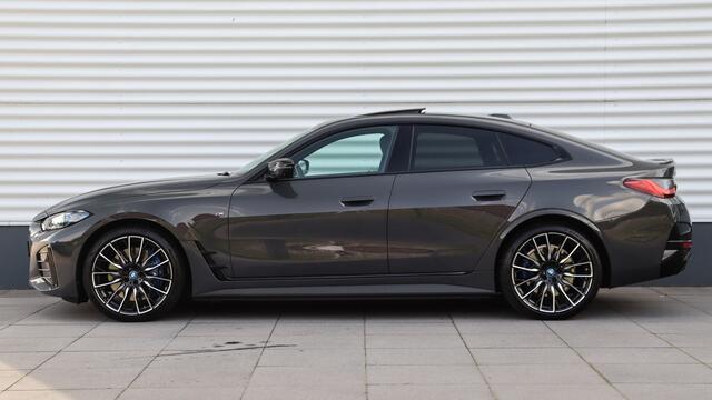 BMW i4 M50 High Executive | Harman/Kardon | Schuifdak | Laserlight | Head-up | Trekhaak | M Sportstoelen | Carbon