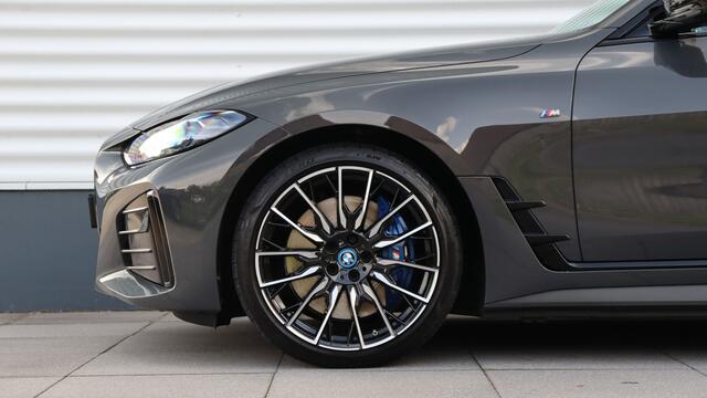 BMW i4 M50 High Executive | Harman/Kardon | Schuifdak | Laserlight | Head-up | Trekhaak | M Sportstoelen | Carbon