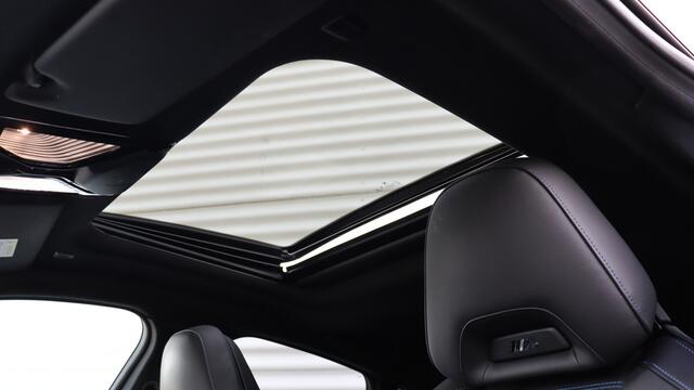 BMW i4 M50 High Executive | Harman/Kardon | Schuifdak | Laserlight | Head-up | Trekhaak | M Sportstoelen | Carbon