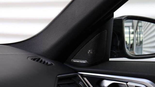 BMW i4 M50 High Executive | Harman/Kardon | Schuifdak | Laserlight | Head-up | Trekhaak | M Sportstoelen | Carbon