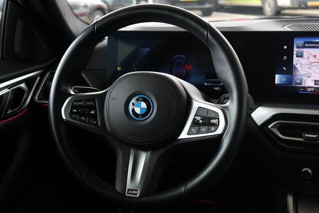 BMW i4 eDrive35 70 kWh M sportpakket | Voorstoelen verwarmd | Achteruitrijcamera