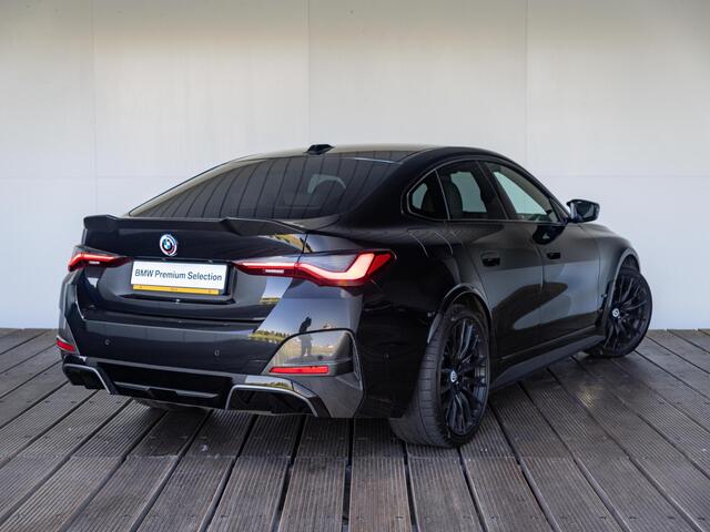 BMW i4 Gran Coupé M50 M-Sportpakket | M-Performance Parts | Trekhaak | 20 inch | Individual interieur | Carbon exterieur pakket