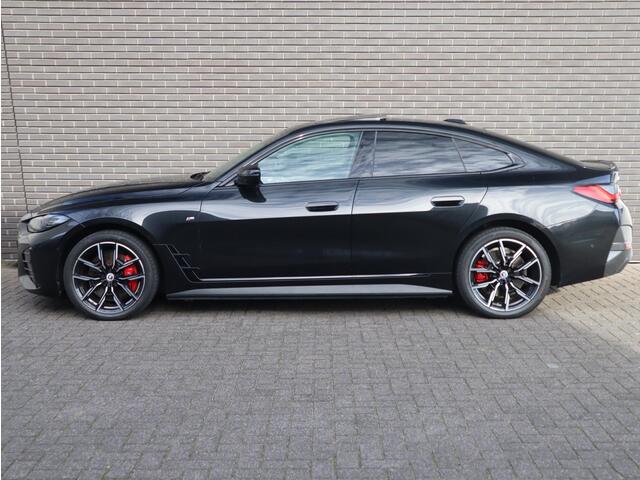 BMW i4 eDrive40 M Sport High Executive 84 kWh / Glasdak / Sfeerverlichting