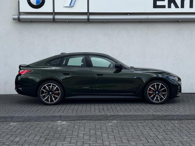 BMW i4 M50 High Executive 84 kWh Sport Pro | High Executive | Glazen schuif-/kanteldak | Stuur- en stoelverwarming | Trekhaak | Comfort Access | Laserlight | Harman Kardon | Head-Up