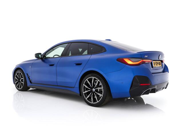BMW i4 M50 M-Sportpack High Executive 84 kWh [ 3-Fase ] {SOH-97%} (INCL-BTW) *HEAD-UP | LASER-LED | LUXURY-LEATHER | HARMAN/KARDON | ADAPTIVE-CRUISE | BLIND-SPOT | TOP-VIEW | HEATED-SPORTSEATS | DAB+ | WIDE-COCKPIT | AMBIENT-LIGHT | NAVI-FULLMAP | 19