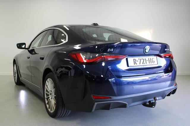 BMW i4 eDrive40 High Executive 84 kWh | SCHUIF/-KANTELDAK | CARPLAY | DAB | NAVIGATIE | HARMAN/KARDON | CAM |