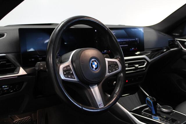 BMW i4 eDrive40 High Executive 84 kWh | SCHUIF/-KANTELDAK | CARPLAY | DAB | NAVIGATIE | HARMAN/KARDON | CAM |