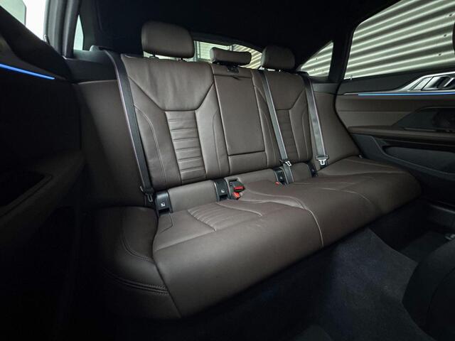 BMW i4 eDrive40 M Sportpakket Pro / High Executive / Achteruitrijcamera / Elektrisch bediend glazen schuif-/kanteldak / Elektrisch verwarmde voorstoelen