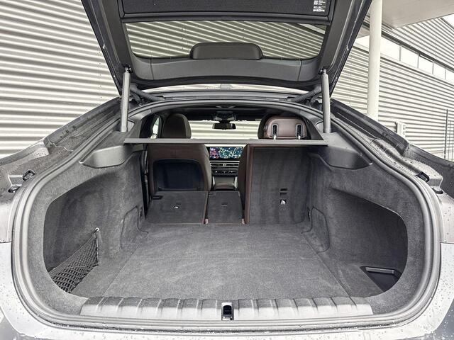 BMW i4 eDrive40 M Sportpakket Pro / High Executive / Achteruitrijcamera / Elektrisch bediend glazen schuif-/kanteldak / Elektrisch verwarmde voorstoelen