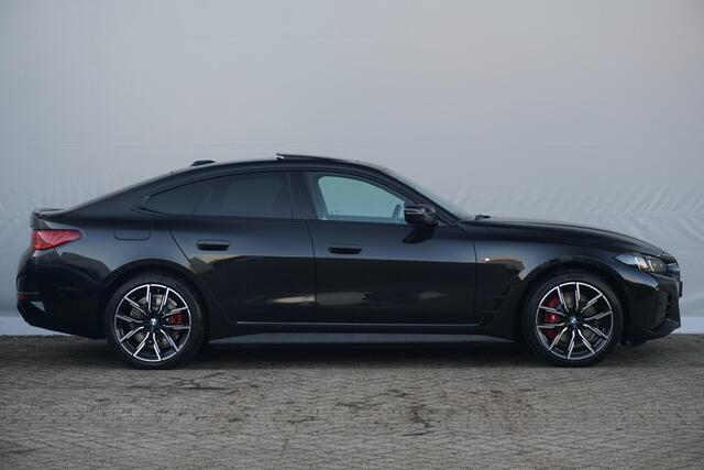 BMW i4 eDrive40 M Sportpakket Pro 19'' / Individual Interieur / Schuif-/kanteldak / Elektrisch verstelbare stoelen / Harman Kardon / Trekhaak