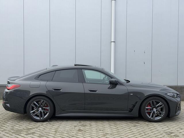 BMW i4 eDrive40 High Executive 84 kWh | M-Sport Pro | Open dak | Harman/Kardon