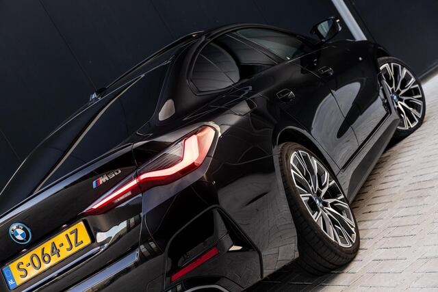 BMW i4 M50 High Executive 84 kWh | SOH 98,8% | M-Sport | Panoramadak | Sportstoelen | Harman/Kardon | X-Drive | Widescreen | Adaptief Onderstel | DAB | Stoel/stuurverwarming | Trekhaak | Laserlicht |