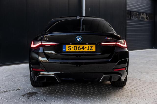 BMW i4 M50 High Executive 84 kWh | SOH 98,8% | M-Sport | Panoramadak | Sportstoelen | Harman/Kardon | X-Drive | Widescreen | Adaptief Onderstel | DAB | Stoel/stuurverwarming | Trekhaak | Laserlicht |