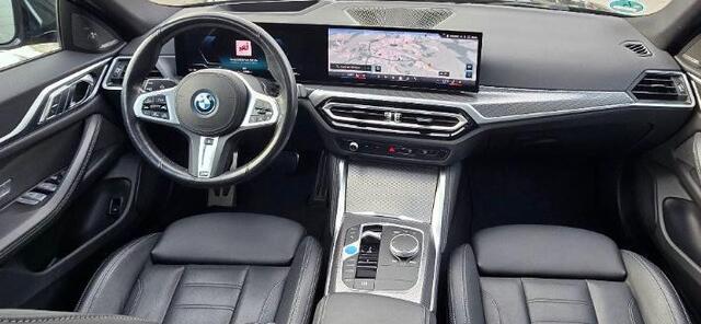 BMW i4 eDrive35 High Executive 70 kWh M Sport | Harman Kardon | Panoramadak | Stuurverwarming | Stoelverwarming | Head-Up Display | Adaptive Cruise Control | Keyless | Memory Seats | Laser Lights | Trekhaak | 360 Camera