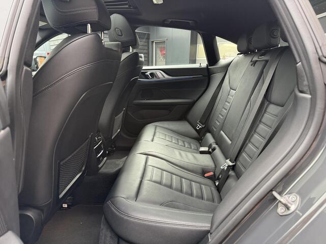 BMW i4 eDrive40 84 kWh | M-Pakket | Schuifdak | Dravitgrau metallic | NL-Auto |