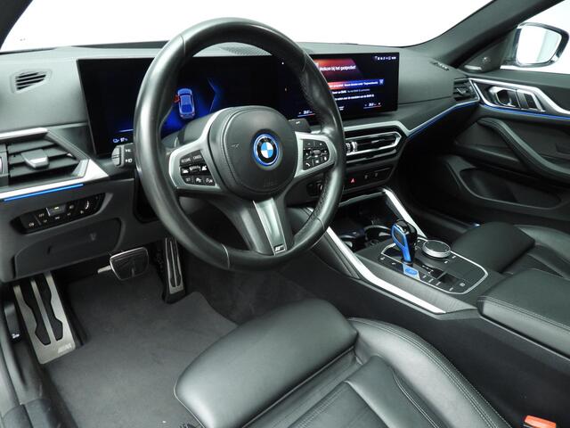 BMW i4 eDrive40 High Executive 84 kWh SoH 93,1% | M Sport | Laser | Schuifdak | Harman/Kardon | Leder