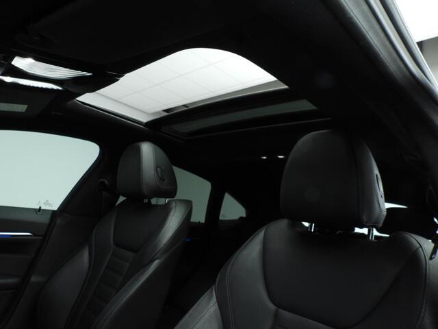 BMW i4 eDrive40 High Executive 84 kWh SoH 93,1% | M Sport | Laser | Schuifdak | Harman/Kardon | Leder