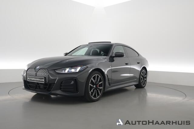 BMW i4 eDrive40 M Sport Pro 84 kWh | S/K-Dak | Elek. Trekhaak | Shadowline | Widescreen | Adapt. Cruise | Camera+PDC | Memory | Stoel-Stuurverw. | Nav+App.Connect V