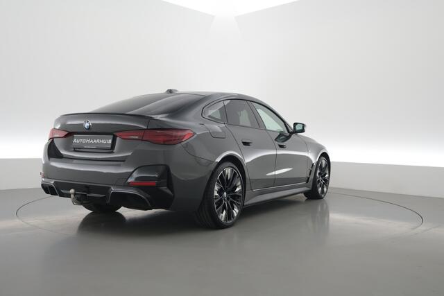 BMW i4 eDrive40 M Sport Pro 84 kWh | S/K-Dak | Elek. Trekhaak | Shadowline | Widescreen | Innovation pack | HUD | 360*+PDC | Carbon | Driving Ass. pro | Memory | Dodehoek V