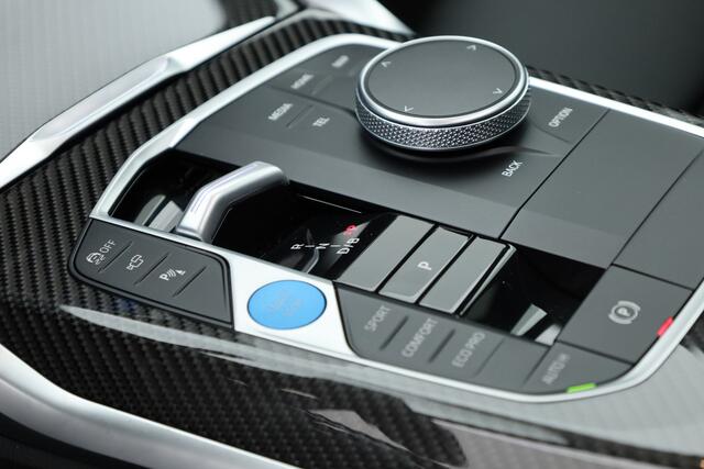 BMW i4 eDrive40 M Sport Pro 84 kWh | S/K-Dak | Elek. Trekhaak | Shadowline | Widescreen | Innovation pack | HUD | 360*+PDC | Carbon | Driving Ass. pro | Memory | Dodehoek V