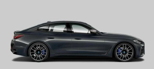 BMW i4 M50 High Executive 84 kWh Schuiif/kanteldak - Elektrisch verstelbare voorstoelen/actieve stoelventilatie - Harman Kardon - Active Cruise Control - Parking Assistant Plus - Ambiance verlichting -