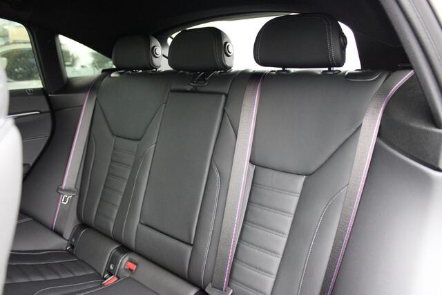 BMW i4 eDrive35 M Sport / Schuif-kanteldak / Achteruitrijcamera / Adaptieve LED / Active Cruise Control / Live Cockpit Plus / Comfort Access