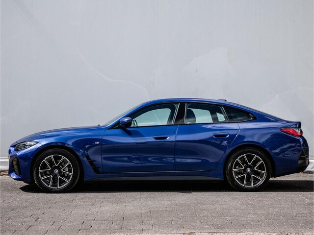 BMW i4 eDrive40 High Executive 84 kWh M-Sport/ Sportstoelen/ Trekhaak/ Stoelverwarming/ Head-up/ Camera