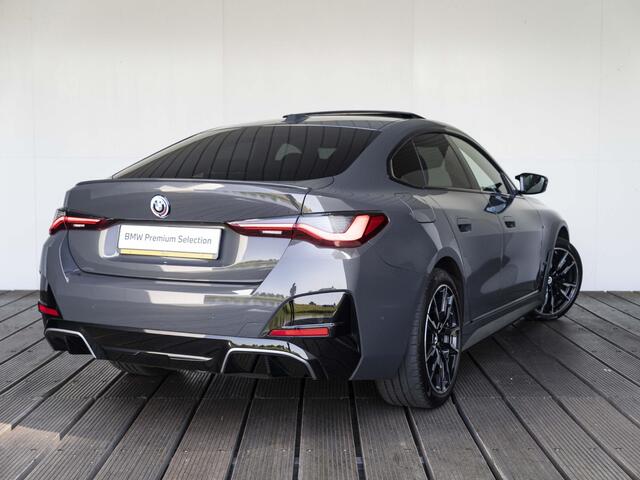 BMW i4 Gran Coupé M50 | M Sportpakket | High Executive | Stuurwielrand verwarmd | Adaptief M Onderstel | Glazen schuif-/kanteldak | Driving Assistant Professional | Trekhaak