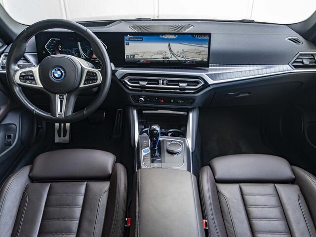 BMW i4 Gran Coupé M50 | M Sportpakket | High Executive | Stuurwielrand verwarmd | Adaptief M Onderstel | Glazen schuif-/kanteldak | Driving Assistant Professional | Trekhaak
