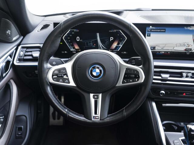 BMW i4 Gran Coupé M50 | M Sportpakket | High Executive | Stuurwielrand verwarmd | Adaptief M Onderstel | Glazen schuif-/kanteldak | Driving Assistant Professional | Trekhaak