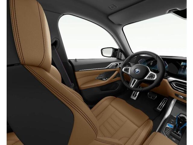BMW i4 M50 High Executive 84 kWh M Sport Pro - Trekhaak - Panoramadak - Driving Assistant Professional - Harman Kardon - Stoelverwarming voor/achter - Getinte Ruiten - Comfort Access -