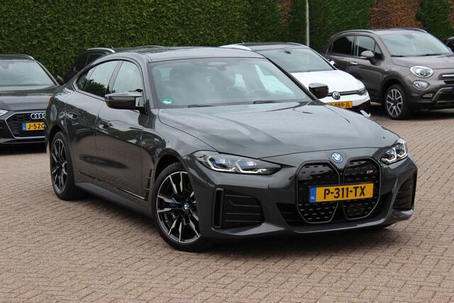 BMW i4 M50 High Executive 84 kWh / 360Camera / Head-up / Leder / Harman Kardon / Carbon intr.+extr. / 19'' / CarPlay / Stoelverwarming / Dodehoek / DAB / Cruise Control Adaptief