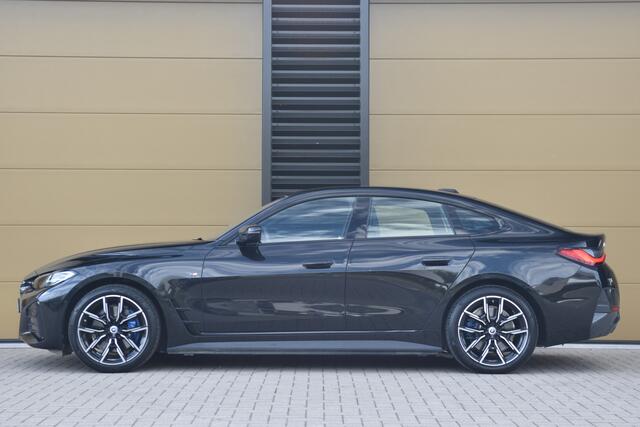 BMW i4 eDrive40 High Executive 84 kWh * M-Sport * Trekhaak * M-Remmen * SOH 96% * Elektrische Stoelen met Memory * Head-up *