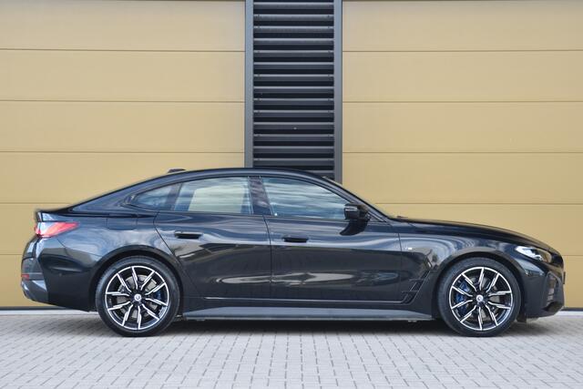 BMW i4 eDrive40 High Executive 84 kWh * M-Sport * Trekhaak * M-Remmen * SOH 96% * Elektrische Stoelen met Memory * Head-up *