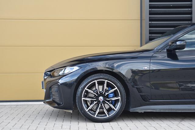 BMW i4 eDrive40 High Executive 84 kWh * M-Sport * Trekhaak * M-Remmen * SOH 96% * Elektrische Stoelen met Memory * Head-up *