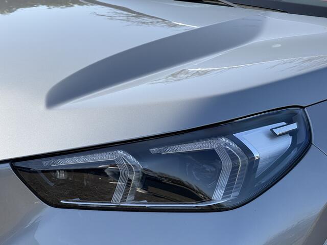BMW iX1 eDrive20 | M-Sport | Stuur + Stoelverw. | Getint Glas | 18'' | Head-Up | Getint Glas