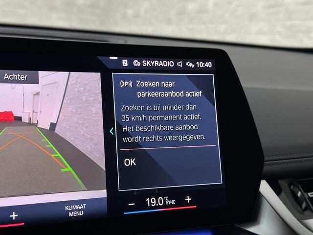 BMW iX1 30 313pk X-Drive M-Sport Performance | Adaptief Led | Sportstoelen | Keyless | 4WD | Adaptieve Cruise en Struurwielverw. voorbereid | Antraciet Hemel | Carplay | Sfeerverlichting | 1200kg Trekgewicht | Camera | Bovag Garantie.