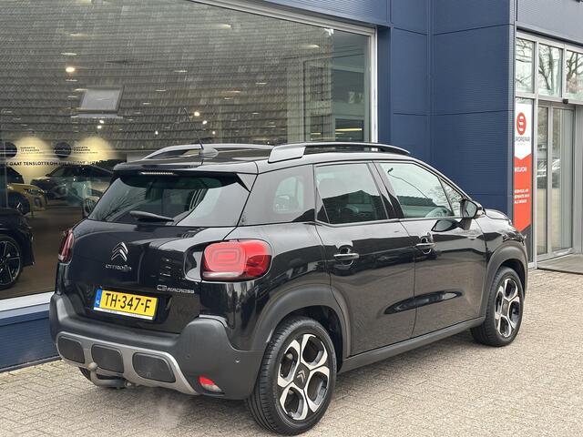 Citroen C3 Aircross 1.2 Turbo 110 PK Shine Automaat | Compacte auto met Hoge Zit | Trekhaak | Navigatie | Cruise Control | Climate Control | Parkeersensoren | Camera | Keyless Entry | Draadloze Telefoonlader | Hi-Fi Systeem | Dode Hoek Signalering | Lichtmetalen Vel
