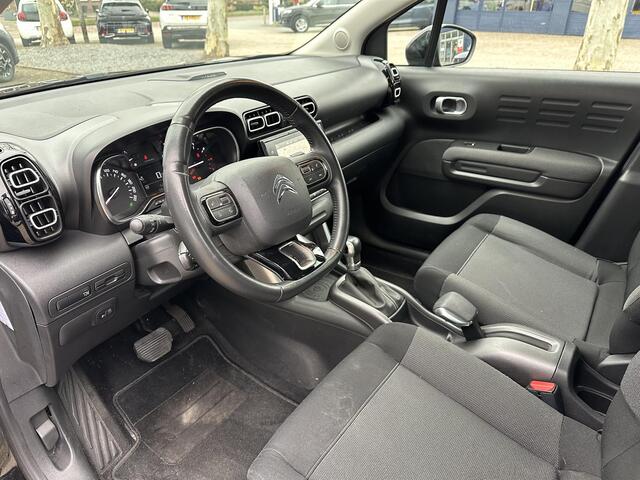 Citroen C3 Aircross 1.2 Turbo 110 PK Shine Automaat | Compacte auto met Hoge Zit | Trekhaak | Navigatie | Cruise Control | Climate Control | Parkeersensoren | Camera | Keyless Entry | Draadloze Telefoonlader | Hi-Fi Systeem | Dode Hoek Signalering | Lichtmetalen Vel