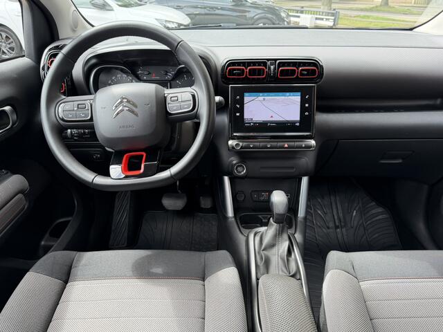 Citroen C3 Aircross 130 Pk Benzine * AUTOMAAT * Luxe Shine * Navigatie * Stoelverwarming * Distributieriem 2026 vervangen * Parkeer Camera + Voor- en Achter Sensoren * 17" L.M. Velgen * DAB Radio * Climate & Cruise Control * Zwart Dak * Keyless Start Vingerhoets; 
