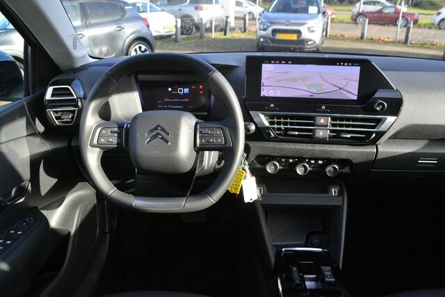 Citroen ë-C4 50 KW I FEEL I NAVIGATIE I ACHTERUITRIJCAMERA I L.M. VELGEN I MICA / PARELMOER KLEUR WIT + ZWART DAK I PARKEERSENSOREN ACHTER I POMPSET I IN STAAT VAN NIEUW I LAGE KM.STAND 128 Km I