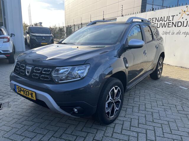 Dacia DUSTER 1.2 TCe Prestige / TREKHAAK / CAMERA / NAVIGATIE
