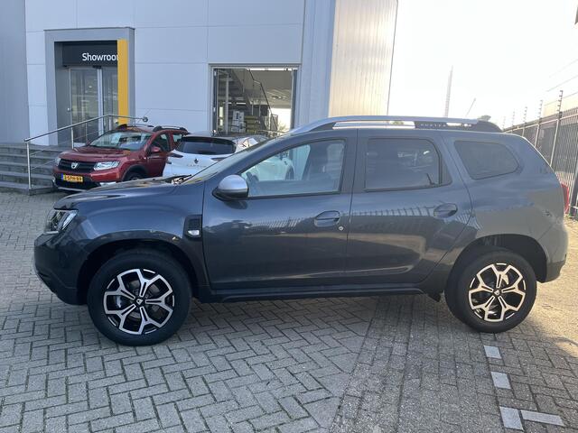 Dacia DUSTER 1.2 TCe Prestige / TREKHAAK / CAMERA / NAVIGATIE
