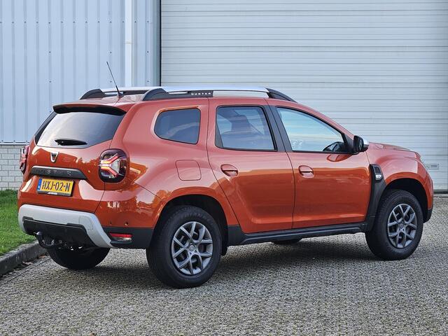 Dacia DUSTER 1.0 TCe Prestige / Trekhaak / Achteruitrijcamera / Stoelverwarming / Navigatie / Apple Carplay & Android Auto / Dode Hoek Detectie / Climate Control / Cruise Control /
