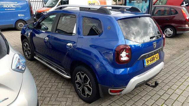Dacia DUSTER 1.0 TCe Bi-Fuel Serie Limitee 15th Anniversary MEERDERE FOTO'S VOLGEN NOG. APPLE CARPLAY ANDROID AUTO / TREKHAAK / CLIMATE CONTROLE PARKEERSENSOREN+CAMERA / CRUISE CONTROLE.