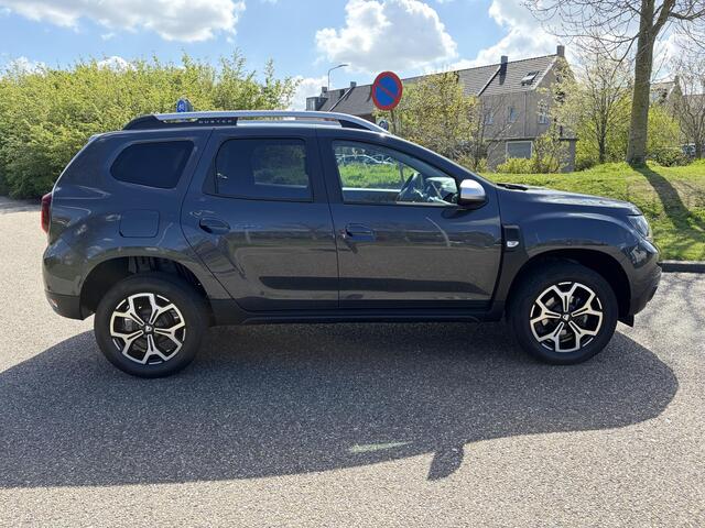 Dacia DUSTER 1.3 TCe Prestige APPLE CARPLAY ANDROID AUTO / AIRCO / PARKEERSENSOREN+CAMERA / NAVIGATIE.